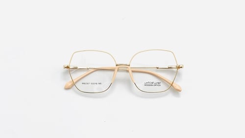 نظارة طبية نسائية سداسية مصنوعة من المعدن اللون ذه...