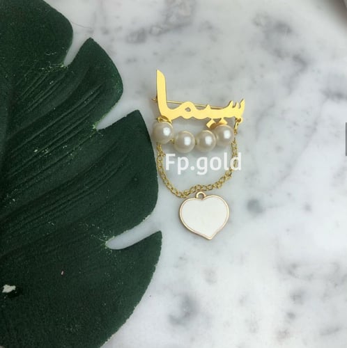 بروش مطلي ذهب مع لولو وقلب