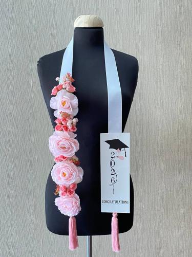 Pink graduation ring 2026 with artificial coral