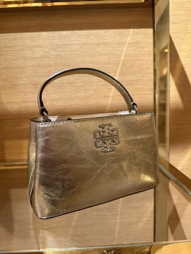 شنطه توري ذهبي