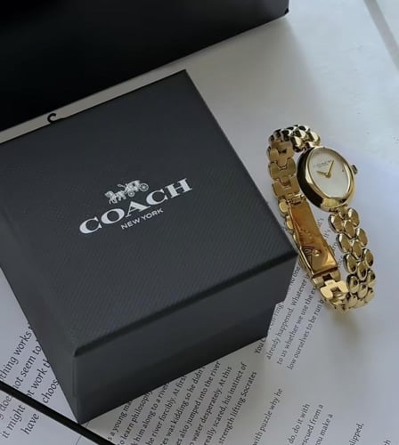 ساعه كوتش ذهبي