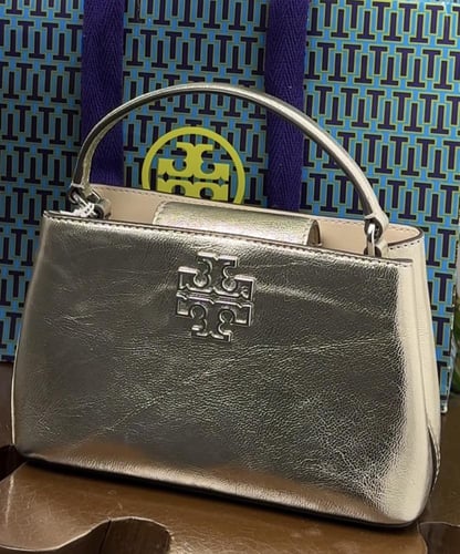 شنطه توري ذهبي