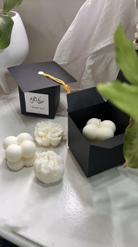 علبة قبعة التخرج مع شمعة