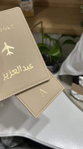 حافظة جواز سفر مع تعليقة الشنطة