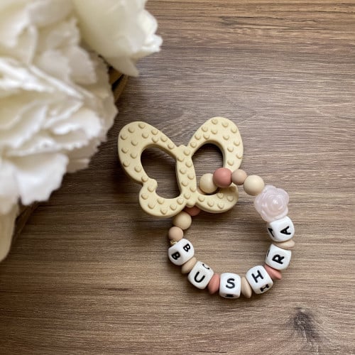 عضاضة فراشة بالاسم