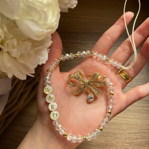 بروش مع خيط لتعليق اللهايه