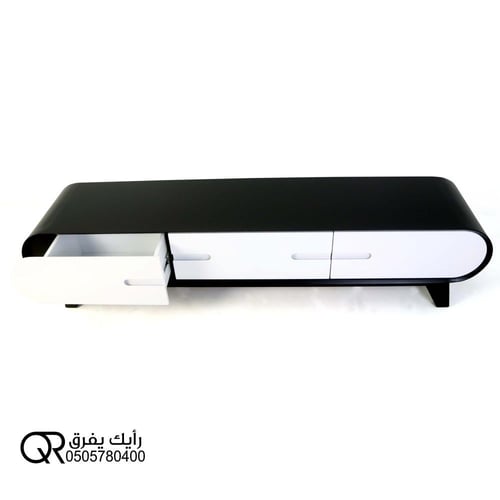 طاولة تليفزيون علي شكل قوس