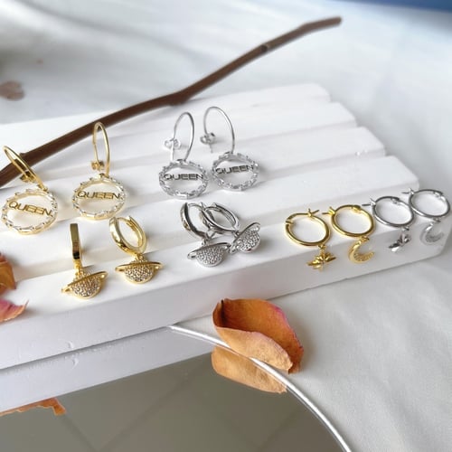 حلق كوكب بأحجار الCZ والفضة المطلية بالذهب