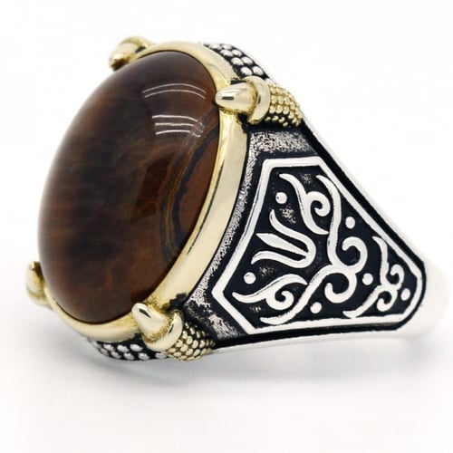 خاتم رجالي ملكي بحجر عين النمر