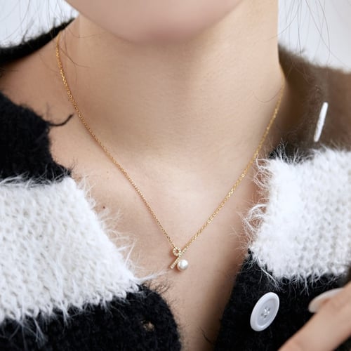 سلسال بالمائة من اللؤلؤ والفضة المطلية بالذهب