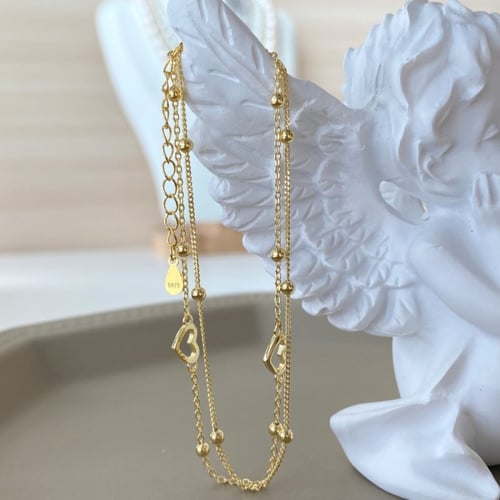 سوار قلوب من الفضة المطلية بالذهب