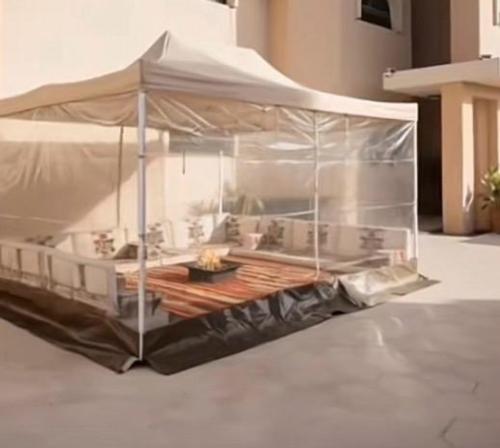 خيمة للحدائق المنزلية " سريع الطي "