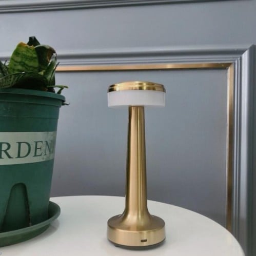 إضاءة طاولة ذهبي