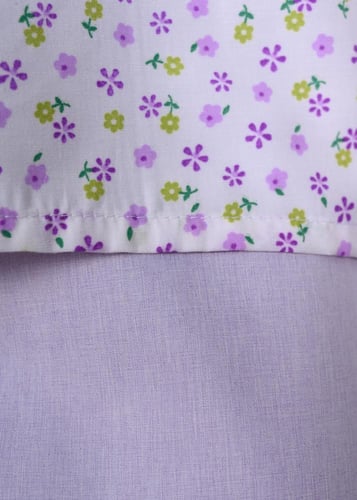 زي عاملة منزلية بطبعة زهور