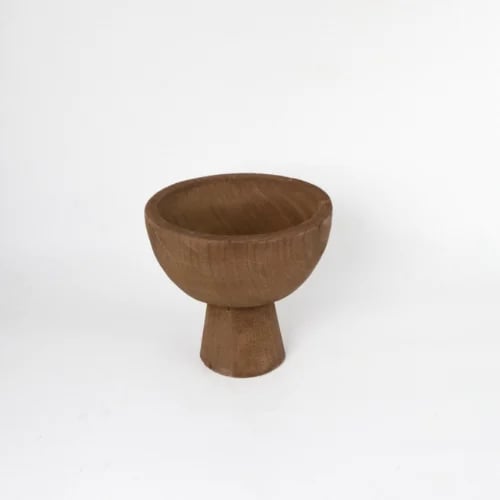Wooden serving bowl with a raised base