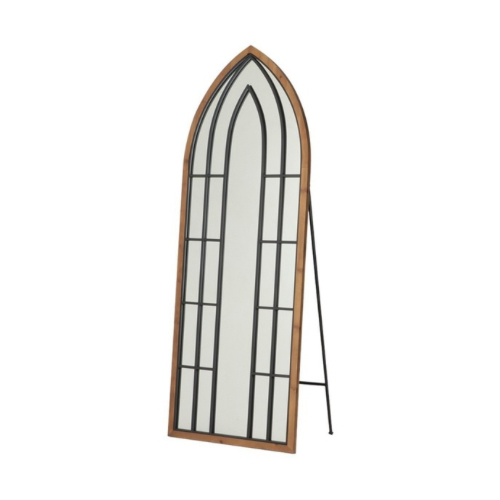 A curved window mirror with a wooden frame and met...