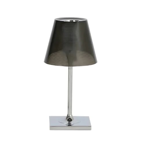 Modern office lamp with a polished metal frame
