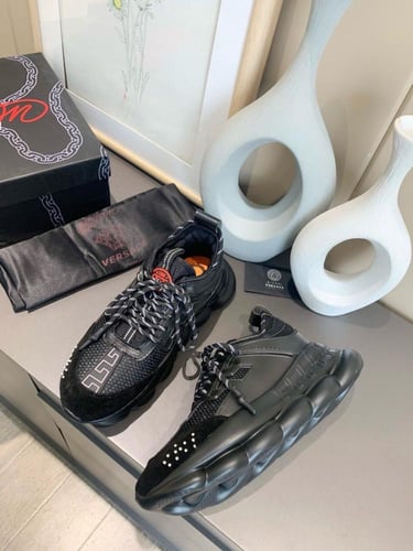 Versace Chain Reaction sneaker with mesh and suede...