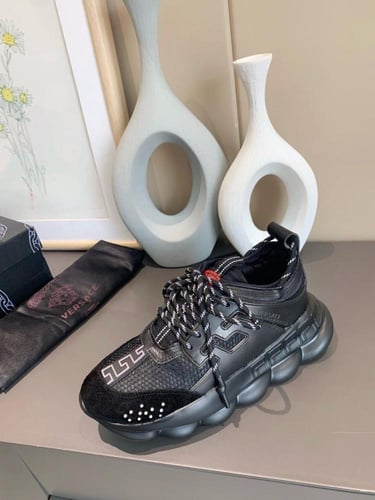 Versace Chain Reaction sneaker with mesh and suede...