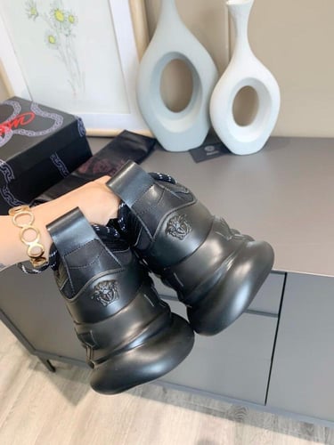 Versace Chain Reaction sneaker with mesh and suede...