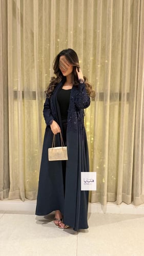 عباية دلع بقماش روز صيفي مع دانتيل مزين بهدب كحلي