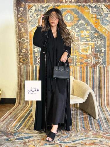 عباية تولين بقماش كريب ملكي بتطريز فضي كشوخي