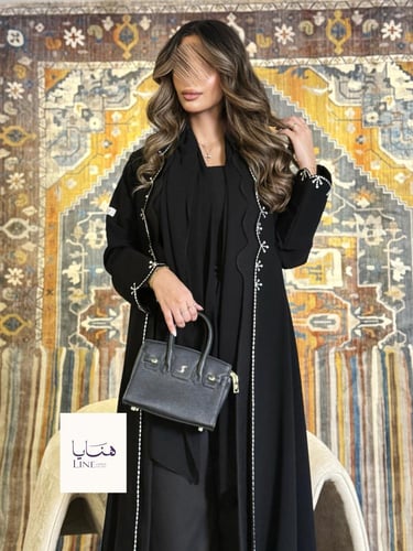 عباية تولين بقماش كريب ملكي بتطريز فضي كشوخي