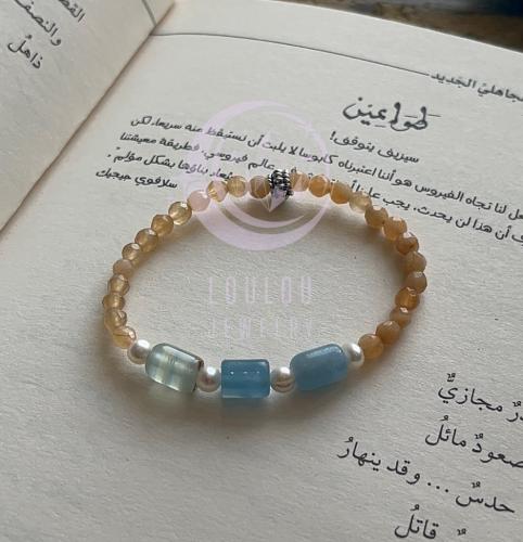 سوارة من حجر عين الهر مع الاسترين ولؤلؤ