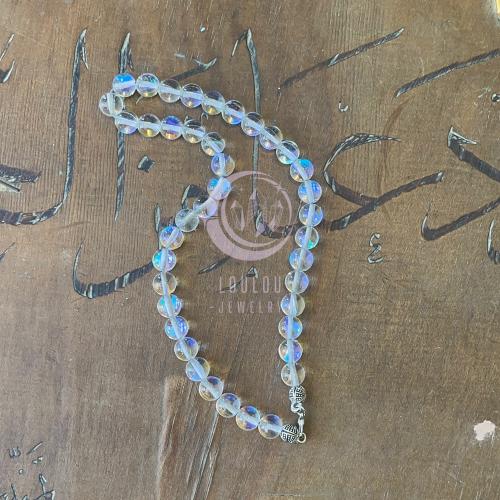 تعليقة غطاء الجوال من حجر ضوء القمر باللون الشفاف