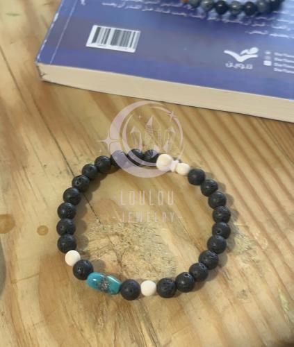 سوارة من حجر الفيروز مع العاج والفحم