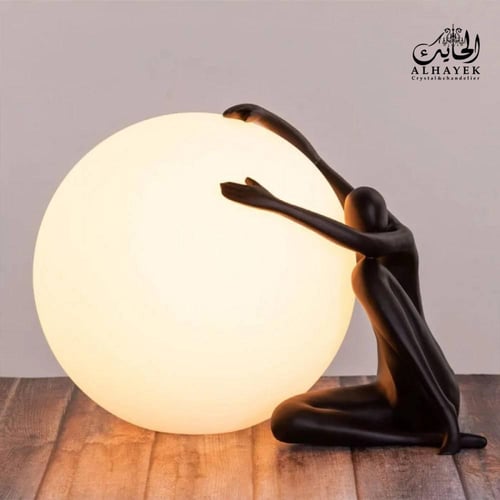 ابجورة طاولة كروي على شكل رجل يبكي