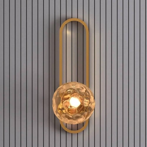 أبليك ذهبي مودرن مع كرة زجاجية مضيئة