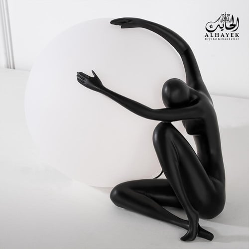 ابجورة طاولة كروي على شكل رجل يبكي