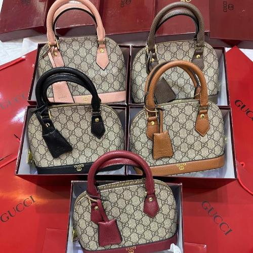 حقيبة GUCCI الأنيقة بنقشة  GG الكلاسيكية ماستر كوا...