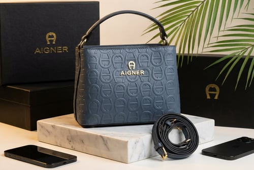 حقيبة أجنر (AIGNER) يد وكتف – فخامة ألمانية بتصميم...