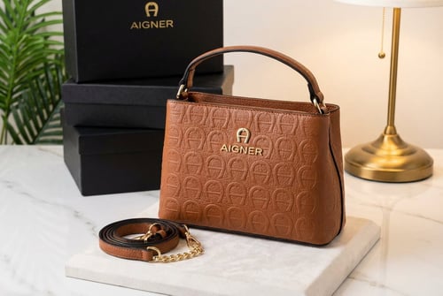 حقيبة أجنر (AIGNER) يد وكتف – فخامة ألمانية بتصميم...