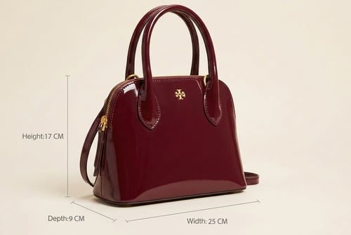 حقيبة يد جلدية من توري بورش فاخرة بتصميم راقٍ ولمس...