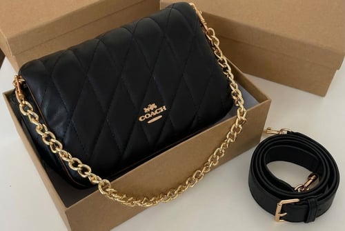 حقيبة كوتش النسائية – جلد مبطن بسلسلة ذهبية . ماست...