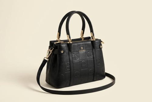 حقيبة AIGNER (انجر) نسائية جلدية بتصميم عملي ماستر...