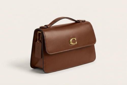 حقيبة كوتش يد أنيقة – تصميم كلاسيكي بلمسة عصرية ....