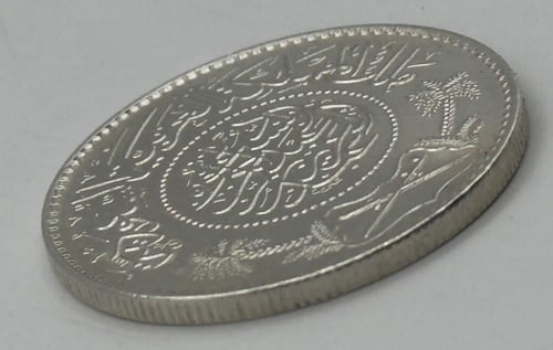 ريال فضه من عهد الملك عبدالعزيز 1354ه الوزن 11.5