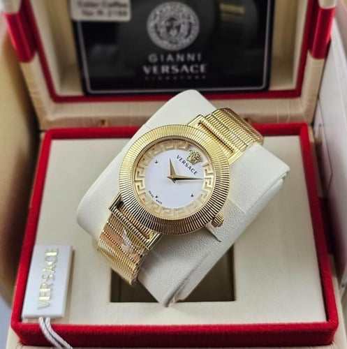 ساعة نسائية ذهبية فاخرة بتصميم أيقوني وشعار بارز |...