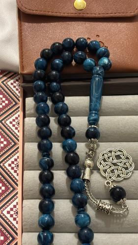 Blue wavy plastic prayer beads