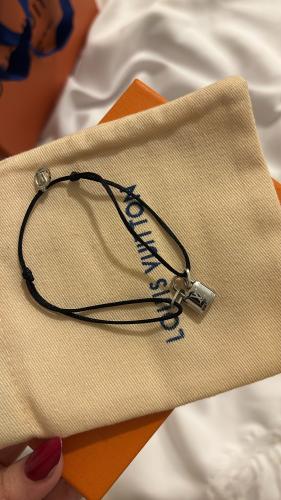 Louis Vuitton bracelet, black thread, with all accessories