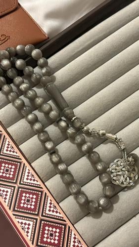 Gray plastic prayer beads with shine
