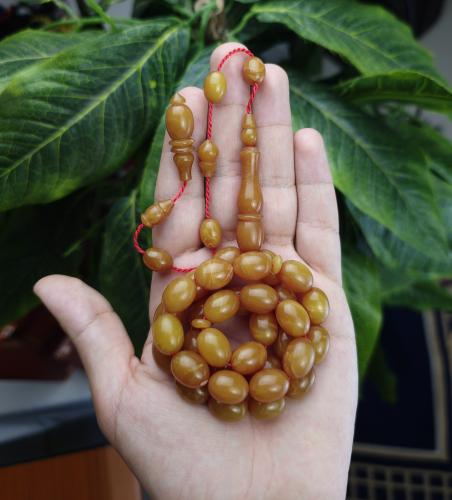 سبحة فاتوران اصفر غامق بتعريقات شفافة تمليكة