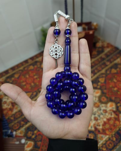 سبحة بكلايت ازرق شفاف حرباء