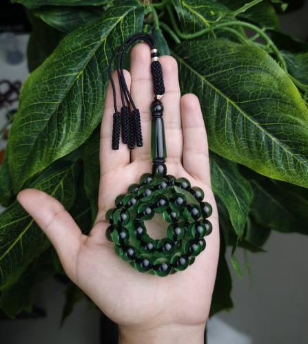 سبحة بكلايت اخضر شفاف خيط اسود كركوشة