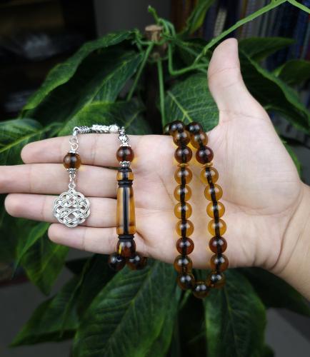 سبحة بكلايت عسلي شفاف خيط اسود