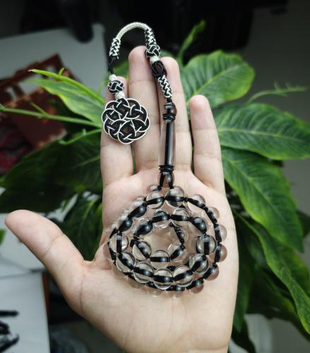 سبحة بكلايت ابيض شفاف خيط اسود طربزونة نحاس